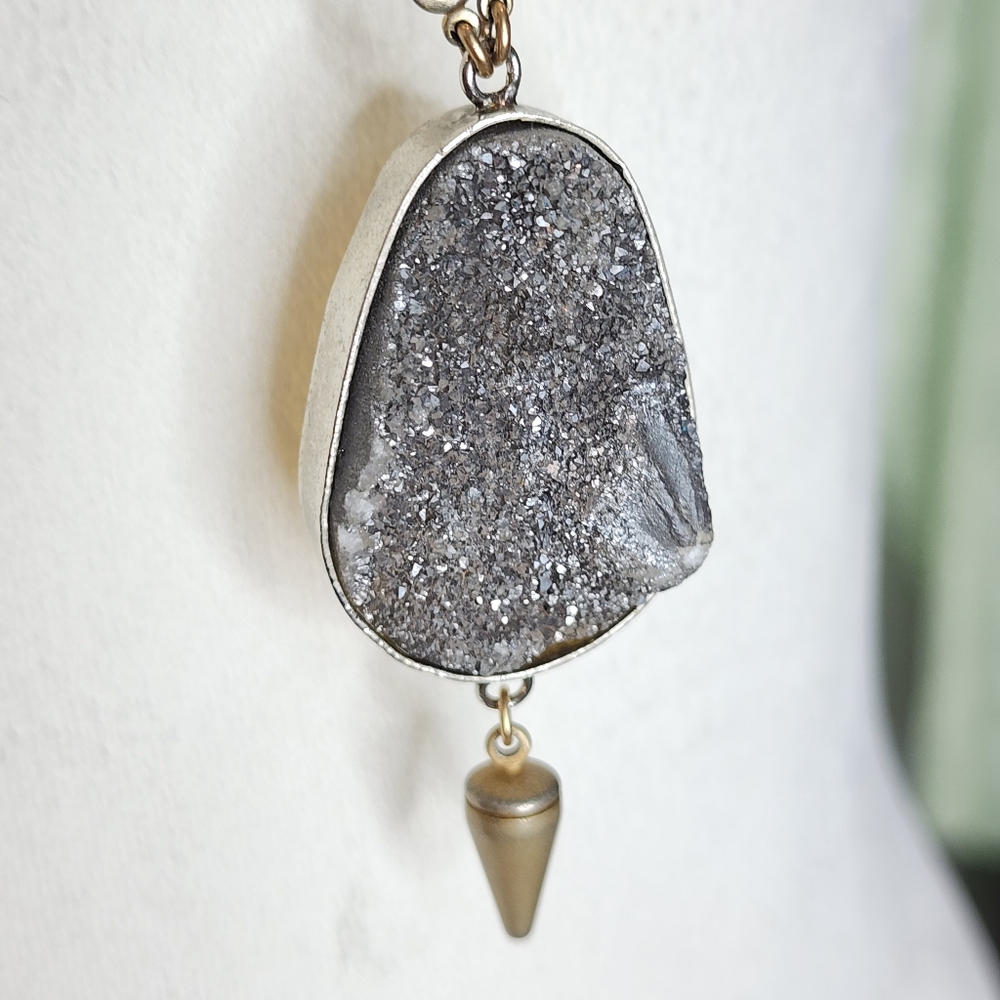 crystal and arrow pendant on gold chain